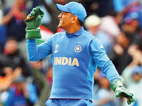 India’s Mahendra Singh Dhoni celebrates the wicket of New Zealand’s Colin de Grandhomme during the semi-final.