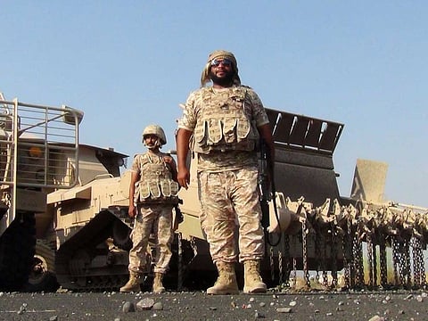 Emirati soldiers, taking part in the Saudi-led operations against Yemeni Al Houthi rebels, seen during rehabilitation and demining operations at the Al Anad airbase in the southern Lahj governorate, some 50 kilometres north of the Red Sea port of Aden on October 4, 2015.