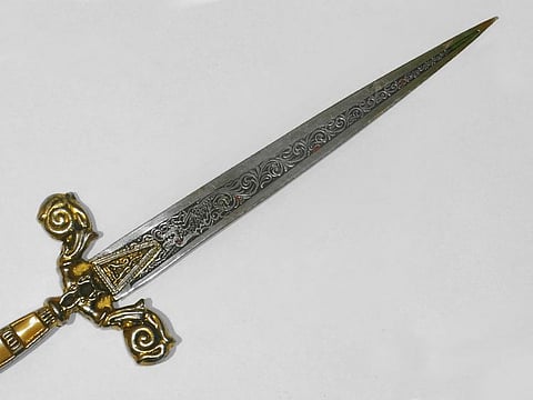 An ancient dagger with ornaments. For illustrative purposes only.