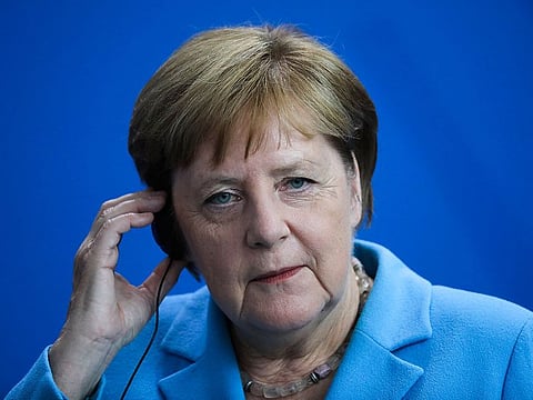 German Chancellor Angela Merkel listens to questions during a news conference following a meeting with the Prime Minister of Finland Antti Rinne at the chancellery in Berlin.