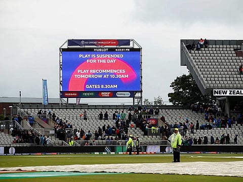 General view of the big screen after rain stopped play between India and New Zealand at Old Trafford, Manchester, Britain.