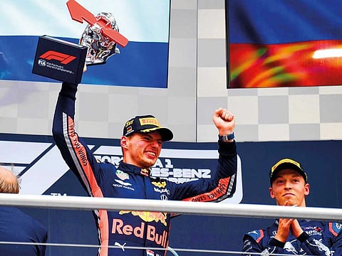 Red Bull’s Max Verstappen of the Netherlands celebrates after he won the German Formula One Grand Prix on Sunday.