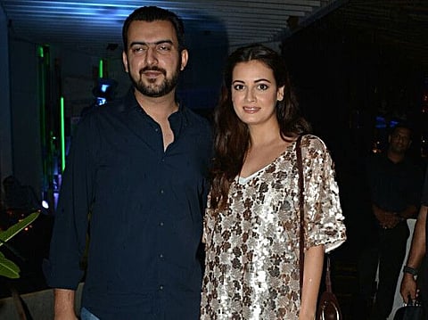Mumbai: Actress Dia Mirza with husband Sahil Sangha at the success party of her film "Sanju", a biopic on actor Sanjay Dutt in Mumbai on July 2, 2018. (Photo: IANS)