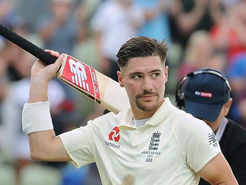 England's Rory Burns acknowledges the crowd as he leaves the field at the end of the second day of the first Ashes Test cricket match between England and Australia at Edgbaston in Birmingham, England