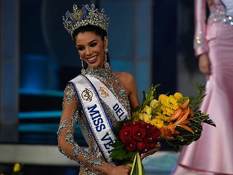 Thalia Olvino representative of the Delta Amacuro reacts during the Miss Venezuela beauty pageant in Caracas, Venezuela on August 1, 2019. / AFP / Federico Parra