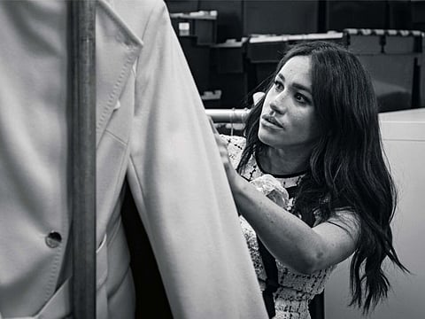 This undated handout photo issued on July 28, 2019 by Kensington Palace shows Britain's Meghan, Duchess of Sussex, Patron of Smart Works, in the workroom of the Smart Works London office. Prince Harry's wife Meghan will guest edit the September issue of iconic fashion magazine British Vogue, which will see her in "candid conversation" with former first lady Michelle Obama. - XGTY / RESTRICTED TO EDITORIAL USE - MANDATORY CREDIT "AFP PHOTO / @SUSSEXROYAL" - NO MARKETING NO ADVERTISING CAMPAIGNS - NO COMMERCIAL USE - NO THIRD PARTY SALES - RESTRICTED TO SUBSCRIPTION USE - NO CROPPING OR MODIFICATION - DISTRIBUTED AS A SERVICE TO CLIENTS
/ AFP / KENSINGTON PALACE / KENSINGTON PALACE / @SussexRoyal / XGTY / RESTRICTED TO EDITORIAL USE - MANDATORY CREDIT "AFP PHOTO / @SUSSEXROYAL" - NO MARKETING NO ADVERTISING CAMPAIGNS - NO COMMERCIAL USE - NO THIRD PARTY SALES - RESTRICTED TO SUBSCRIPTION USE - NO CROPPING OR MODIFICATION - DISTRIBUTED AS A SERVICE TO CLIENTS