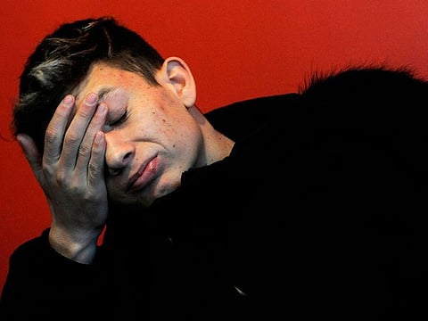 Argentinian Ezequiel Villalonga, 18, a victim of sexual abuse, gestures as he speaks during an interview with AFP at the Association for the Promotion and Protection of Human Rights headquarters, in Mendoza, Argentina on August 1, 2019.