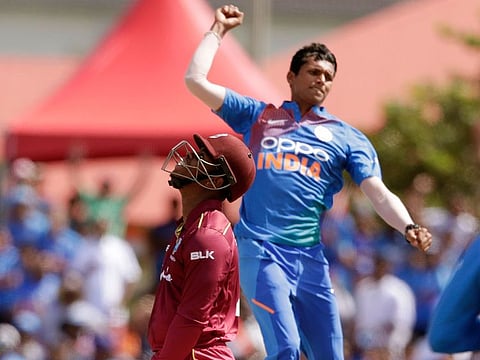 West Indies' Shimron Hetmyer, left, reacts as he is bowled by India's Navdeep Saini, right, during the first Twenty20 international cricket match, on August 3, 2019, in Lauderhill, Florida.