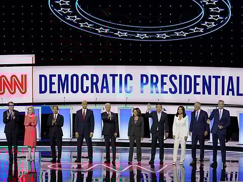 Candidates take the stage before the Democratic presidential debates in Detroit on July 31, 2019. From left: Sen. Michael Bennet, Sen. Kirsten Gillibrand, Former housing secretary Julian Castro, Sen. Cory Booker, former vice-president Joe Biden; Sen. Kamala Harris, Andrew Yang, Rep. Tulsi Gabbard, Gov. Jay Inslee of Washington and New York City Mayor Bill de Blasio.