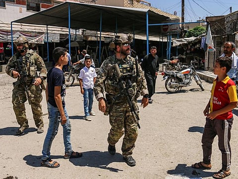 US soldiers in a market in the town of Ras al-Ain in Syria's Hasakeh province near the Turkish border on July 28, 2019.