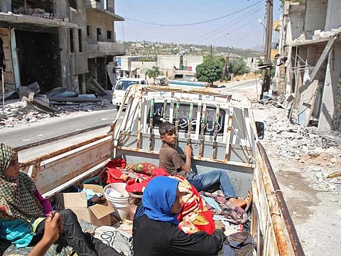 Displaced Syrians who fled from their villages in the south of Idlib province to escape bombing by Syrian government forces, return home shortly before a truce fell apart between rebels and President Bashar Al Assad's regime.