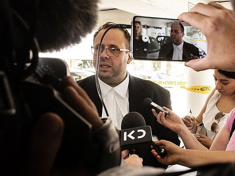ndreas Pittadjis, the lawyer of a British teenager who was arrested on suspicion of falsely accusing 12 Israeli tourists of gang rape at the hotel where she was staying in the Cypriot popular resort of Ayia Napa on July 17, speaks to the press outside the Famagusta district court.