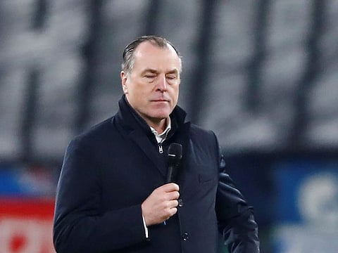 Clemens Toennies, president of German's first division Bundesliga soccer club Schalke 04 stands on the pitch