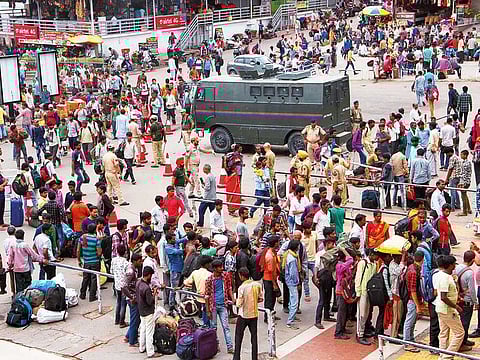 Passengers at a railway station in Jammu, Wednesday, Aug 7, 2019.
