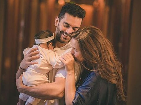 Neha Dhupia with husband Angad Bedi and daughter Mehr