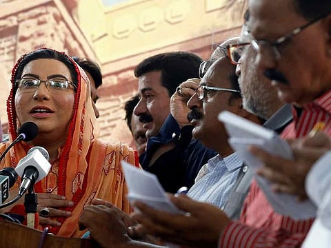 Firdous Ashiq Awan (L), Special Assistant to the Prime Minister for Information and Broadcasting, speaks as reporters take notes during a meeting with the press in Karachi, Pakistan in this July 22, 2019 file photo.