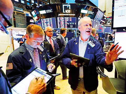 Traders on the floor of the New York Stock Exchange. The S&P 500, an index broadly considered to represent global markets, last week ended down 16 per cent from an all-time peak hit in mid-February.