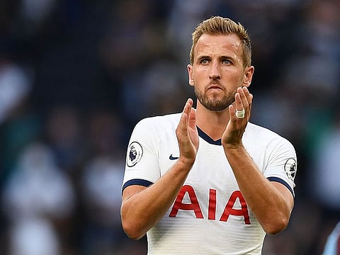 Tottenham Hotspur's English striker Harry Kane gestures at the final whistle during the English Premier League football match between Tottenham Hotspur and Aston Villa at Tottenham Hotspur Stadium in London.