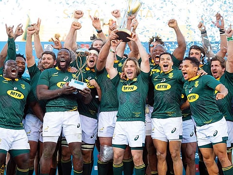 South African's players clebrate after winning the Rugby Championship at the end of a match between Argentina and South Africa in Salta, Argentina.
