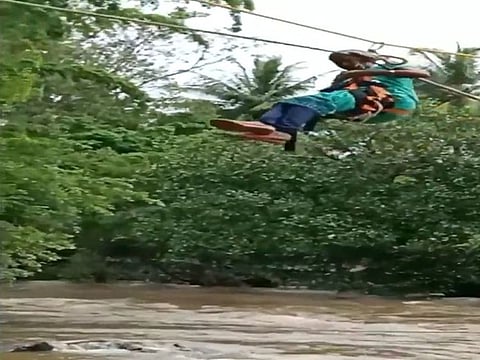 Kerala woman ziplines to safety in Kerala floods