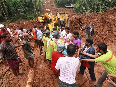 DMCC Kerala volunteers helping flood ravaged Kerala victims rehabilitate
