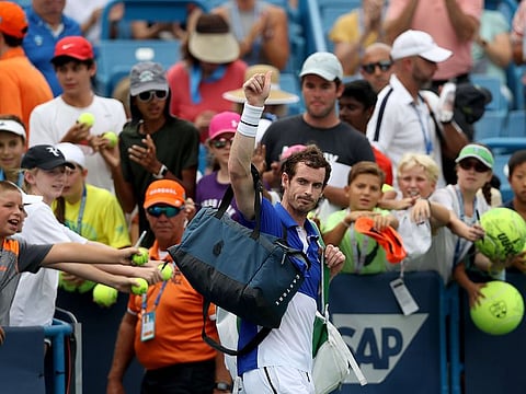 Andy Murray leaves the court after losing to Richard Gasquet.