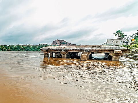 Waters from the swollen Tungabhadra River flooding historic monuments at Hampi, a UNESCO World Heritage site, in India's southern Karnataka state.