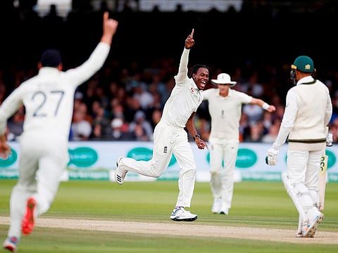 England's Jofra Archer celebrates taking the wicket of Australia's Usman Khawaja.