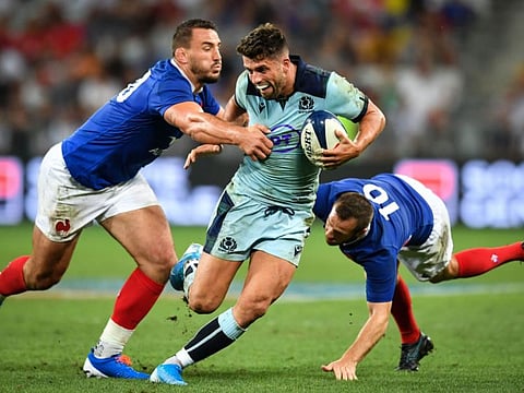 Scotland's fly-half Adam Hastings (centre) being hemmed in by two French players during the 2019 Rugby World Cup warm-up Test match at the Allianz Riviera stadium in Nice on Saturday.