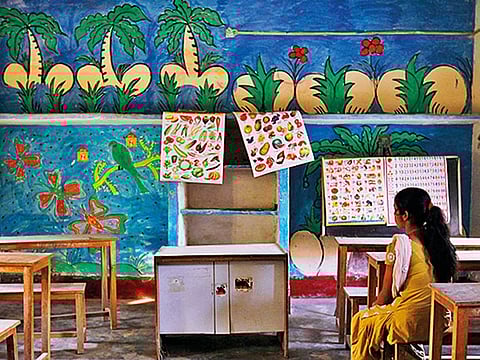 A 16-year-old girl sits inside a protection home on the outskirts of New Delhi.
