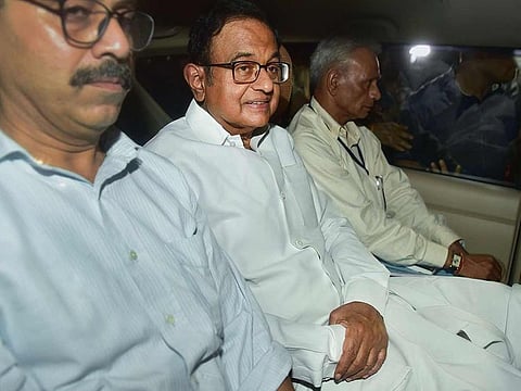 Central Bureau of Investigation (CBI) officials arrest Congress leader P Chidambaram from his Jor Bagh residence in New Delhi, Wednesday, Aug 21, 2019.