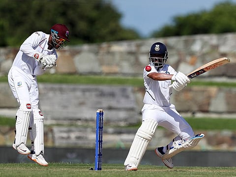 India's Ajinkya Rahane plays a shot against West Indies.