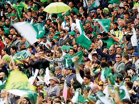 Pakistan fans celebrate.