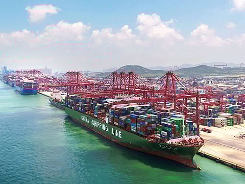 A container ship being loaded at a port in Qingdao, eastern China. Chinese manufacturers and suppliers looking to alternate markets to feed their goods in the wake of the trade war with US.