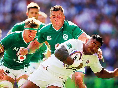 England's Manu Tuilagi scores his side's third try of the game during the international match against Ireland at Twickenham Stadium, London, on Saturday.