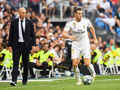 Real Madrid's coach Zinedine Zidane and Gareth Bale