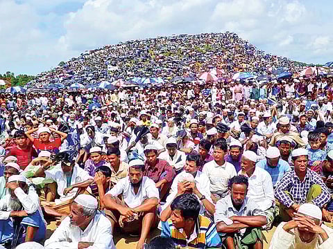 Rohingya refugees gather to mark the second anniversary of the exodus at the Kutupalong camp in Cox’s Bazar, Bangladesh.