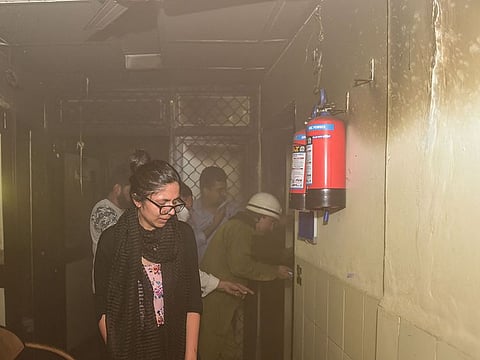 Delhi Commission for Women Chairperson Swati Maliwal during a fire which broke out in the conference hall of her office, on the second floor of Vikas Bhawan in New Delhi, Tuesday, Aug 27, 2019.