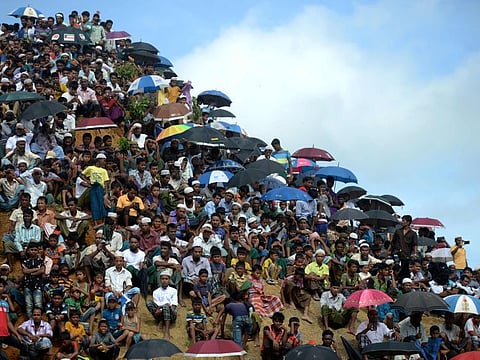 Rohingya refugees attend a ceremony organised to remember the second anniversary of a military crackdown that prompted a massive exodus of people from Myanmar to Bangladesh, at the Kutupalong refugee camp in Ukhia.