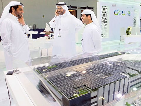 Visitors at the Dewa pavilion at the World Energy Forum.