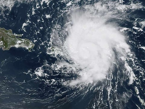 This satellite image obtained from NOAA/RAMMB, shows Tropical Storm Dorian as it approaches Puerto Rico in the Caribbean at 17:0 UTC on August 28, 2019.