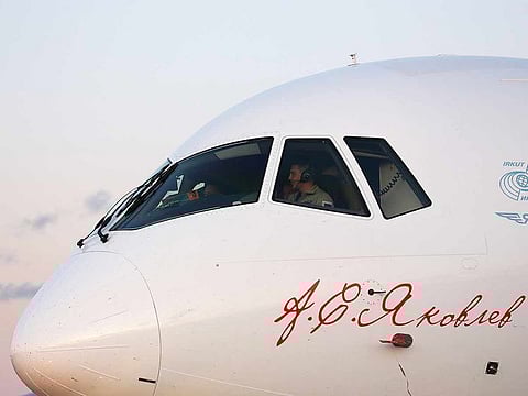 Pilots sit inside the cockpit of an Irkut Corp PJSC MC-21-300 passenger aircraft on display at the MAKS International Aviation and Space Salon at Zhukovsky International Airport in Moscow, Russia, on Tuesday, Aug. 27, 2019.