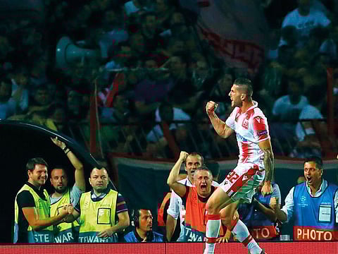 Red Star’s Aleksa Vukanovic celebrates after scoring his side’s opening goal during the Champions League play-off, second leg soccer match between Red Star and Young Boys on the stadium Rajko Mitic in Belgrade, Serbia.