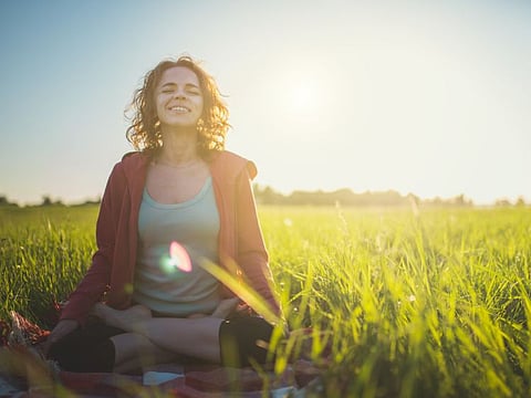 Yoga Meditation Outdoors in Lotus Position