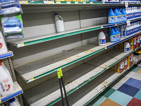 Empty shelves are seen near cleaning supplies for sale at a supermarket ahead of Hurricane Dorian in Patillas, Puerto Rico, on Wednesday, Aug. 28, 2019.