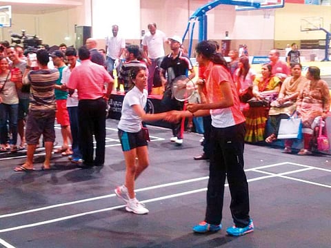 Tanisha Crasto (in white), then a tiny 11-year-old at the start of her career with the Prime Star Badminton Academy, welcomes Indian sensation PV Sindhu at the Dubai World Trade Centre's Dubai Sports World, in 2014.