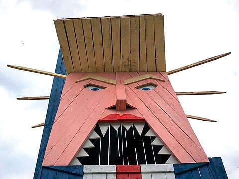 A wooden statue resembling Donald Trump is built near Kamnik, Slovenia.