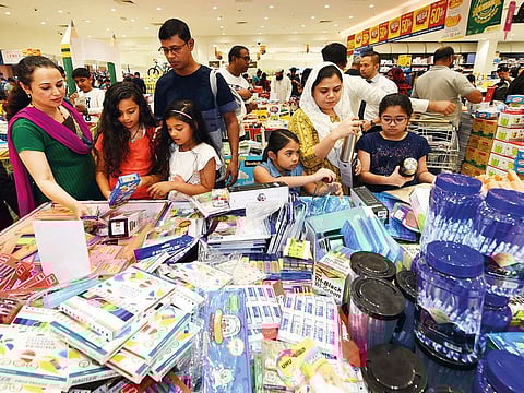 A family buying school items at LuLu Hypermarket in Al Ghusais. Parents were busy last week buying school items and completing registration or admission formalities for children.