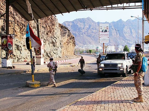 Southern Transitional Council forces guard a checkpoint in Aden, Yemen, on Saturday. Over the weekend Security Belt Forces, aligned with the STC, carried out anti-Al Qaida operations.