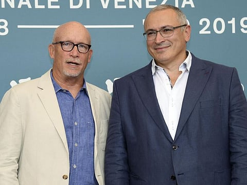 US filmmaker Alex Gibney (L) and Exiled Russian businessman Mikhail Khodorkovsky pose at a photocall for 'Citizen K ' during the 76th annual Venice International Film Festival, in Venice, Italy, 31 August 2019. The movie is presented in out of competition at the festival running from 28 August to 07 September. ANSA/CLAUDIO ONORATI
